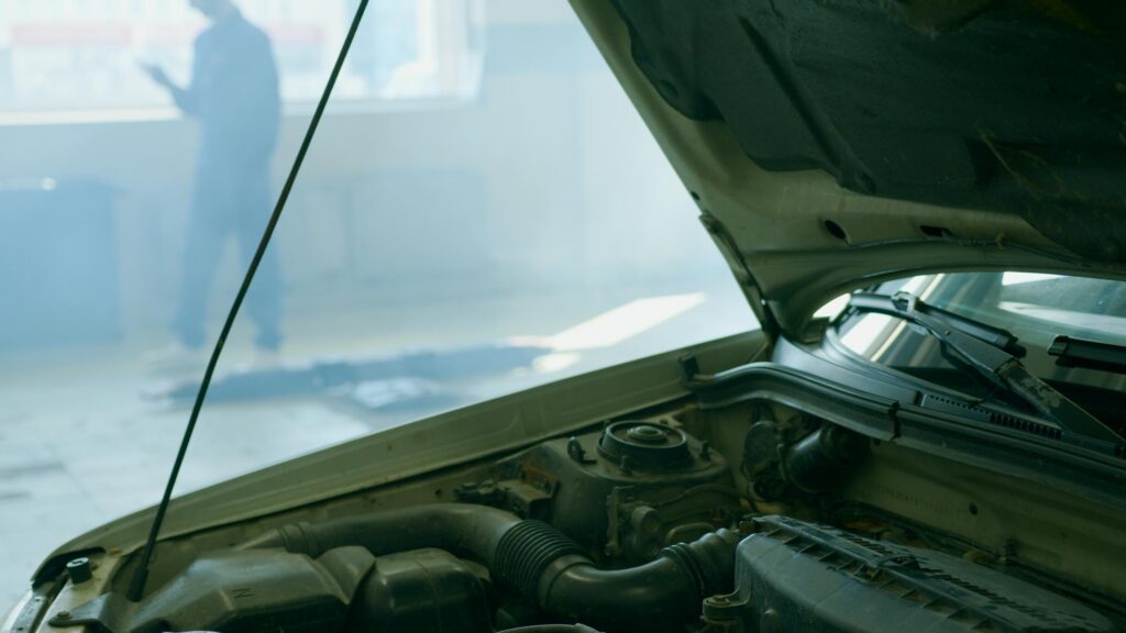 Used car tire wear check - vehicle repair scene at a Korean auto shop