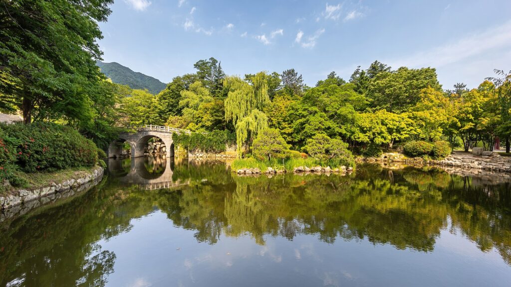 Gyeongju autumn foliage Banya-yeonji pond reflection at Bulguksa with bridge and maple trees