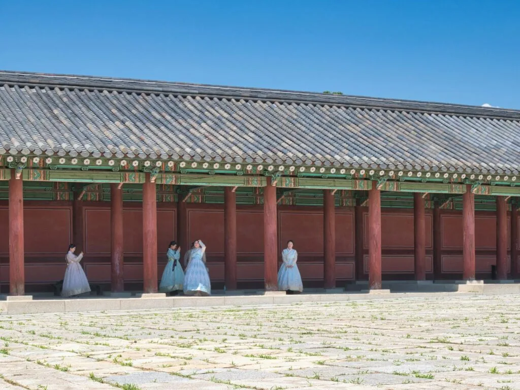 Korean traditional wedding hanbok at a palace setting — Gyeongbokgung atmosphere